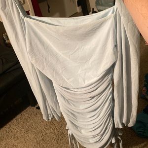 Light blue tight medium length dress